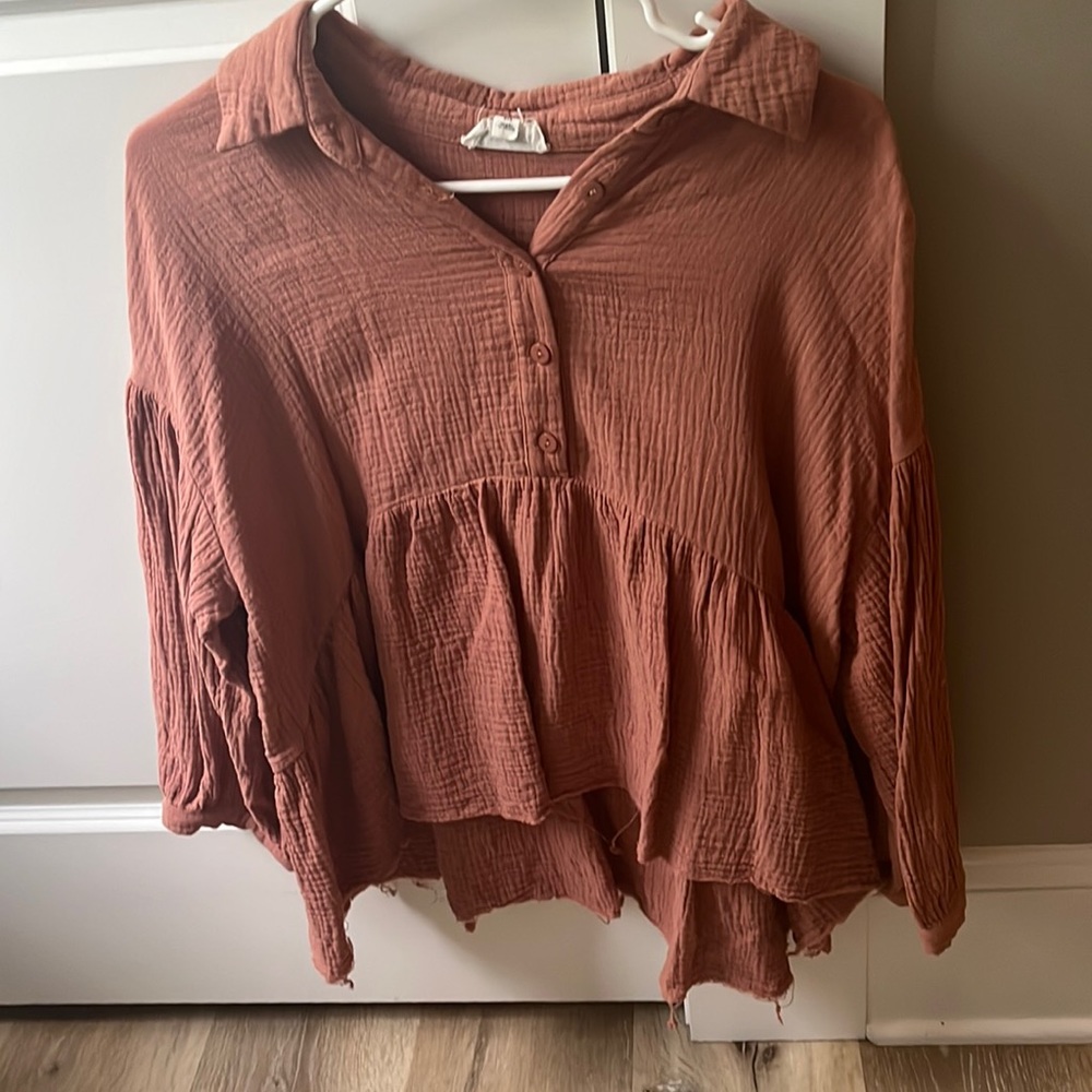 Pink button up top